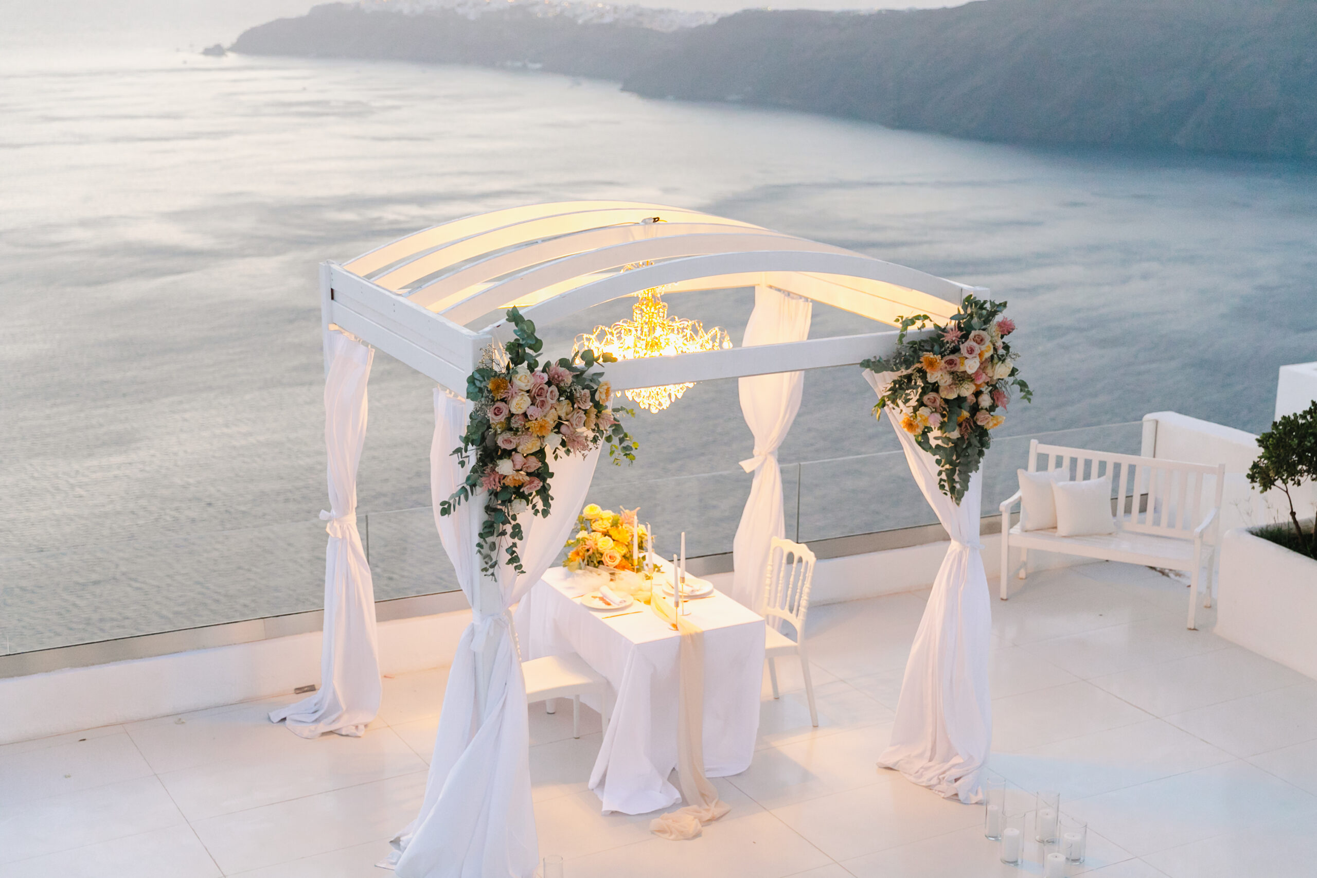 Andromeda Villas Santorini, romantic cliffside wedding terrace in Santorini