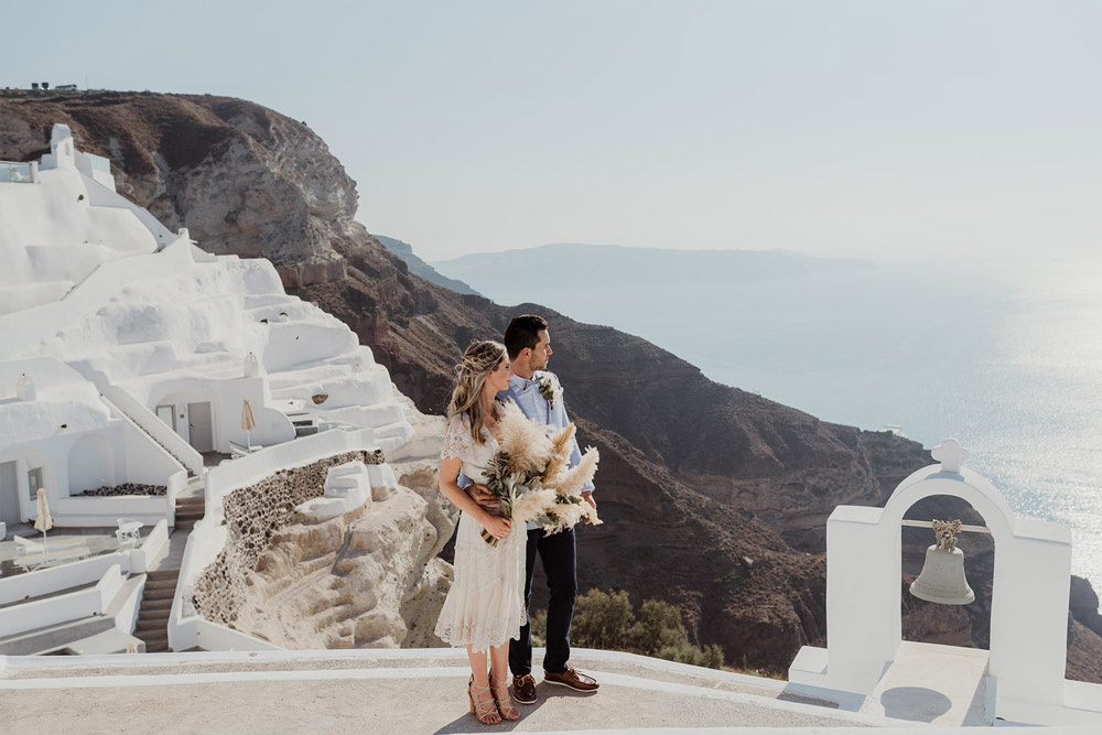 Stunning cliffside chapel with traditional white architecture wedding venue in Santorini